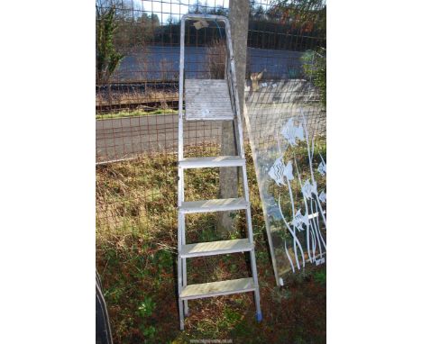 A Five-rung Aluminum Step-ladder.