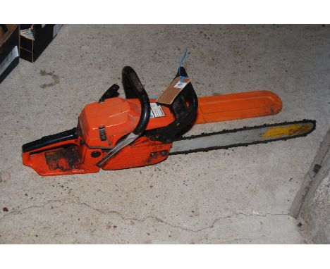 A 'Timber wolf' chainsaw with chain brake (working at time of lotting).