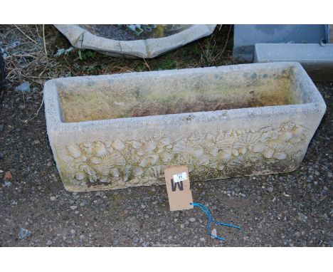 A concrete Planter - 30" wide x 10" depth x 10" high.