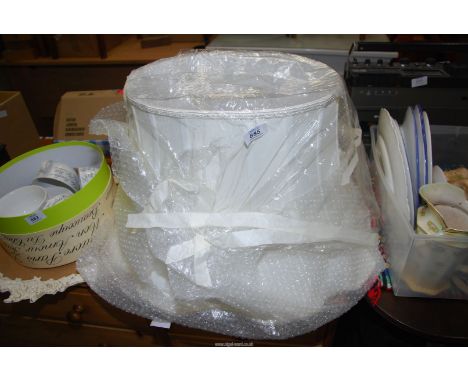 A large standard lamp shade.