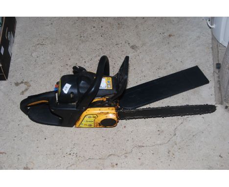 A McCullough Chainsaw with chain brake  (working at time of lotting).