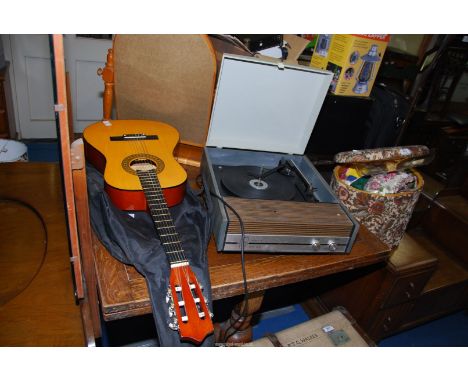 A 'Fidelity' Record player and a 'Palma' Guitar - cased.