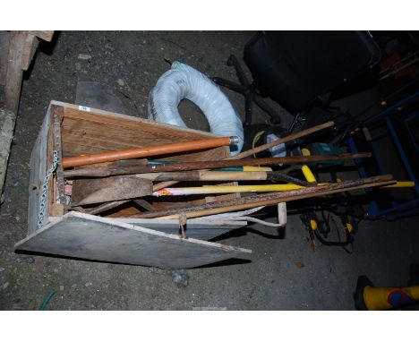 A wooden box of Gardening tools, including Spade and Rake, etc.