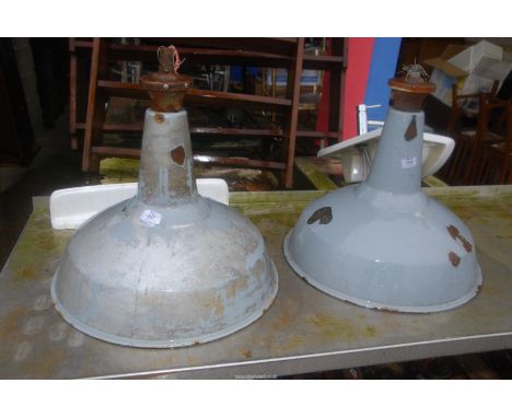 Enamel industrial light shades.