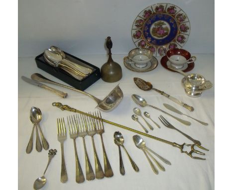 Selection of cutlery including large ladle stamped 90, brass bell with ribbed grip and Bavarian plate and two cups and saucer