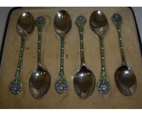 Cased set of silver hallmarked teaspoons with enamel work detail to the handles