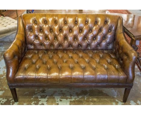 HALO SOFA, Georgian style in brass studded and deep button upholstered hand finished leaf brown leather, stamped 'Halo', 185c