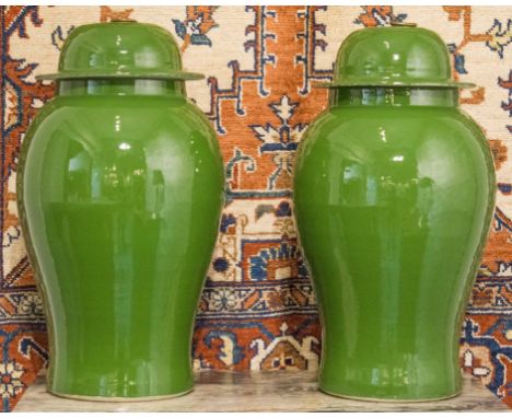 CHINESE JADE GREEN VASES, a pair, ceramic ginger jar form with lids, 53cm H. (2)