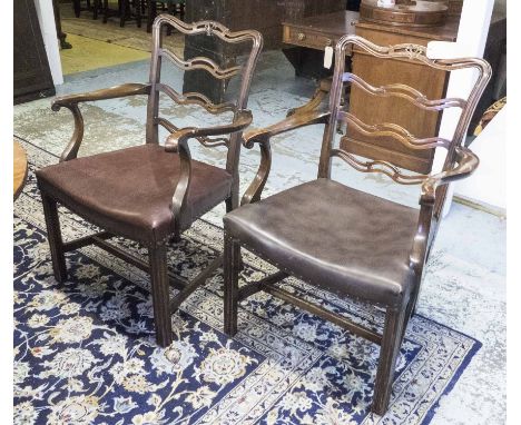 DINING CHAIRS, a set of eight carvers, Chippendale style mahogany with ladder backs and leatherette stuff over seats, 64cm x 