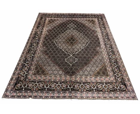 FINE PERSIAN PART SILK MAHI DESIGN CARPET, 285cm x 206cm, concentric Mahi design fields, within corresponding borders.