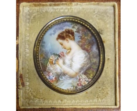 CONTINENTAL SCHOOL 'Miniature portrait of a young woman wearing a green dress', watercolour, with two other oval ones, 5cm Di