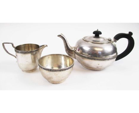 GEORGE IV THREE PIECE SILVER TEA SERVICE, with Greek key banded decoration, the tea pot with ebonised handle and knob plus en