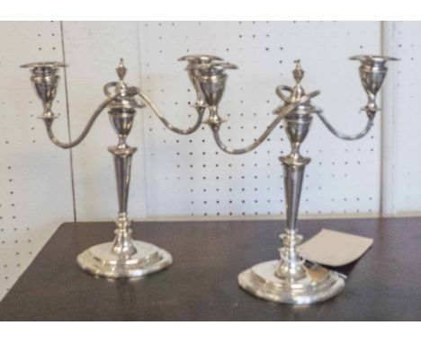SILVER CANDELABRA, each with twin lighting arms, Sheffield 1930, 23cm H. (2)