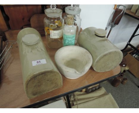 A miscellaneous selection including ceramic bed warmer, pestle and glass storage jars