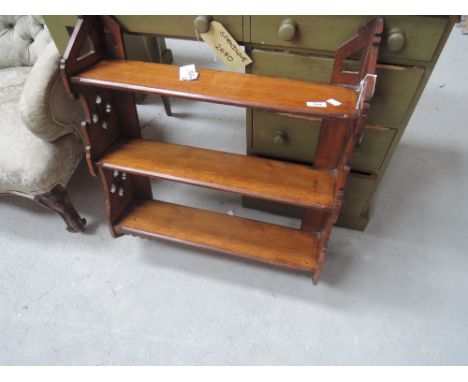 A Victorian oak wall shelf 