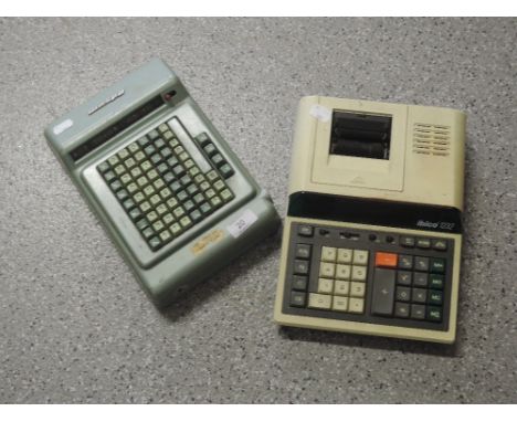A vintage Brunsviga Adsum desk calculator and an Ibico 1232 calculator