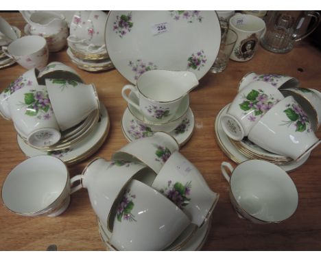 A Windsor part tea service with violets design (40 pieces approx)
