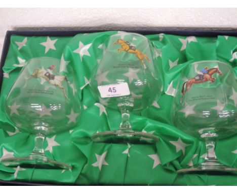 A boxed set of Martell Cognac glasses commemorating the 2002 Grand National, picturing first three horses 