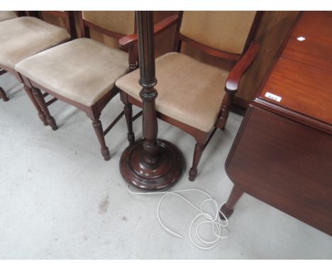 A mahogany standard lamp