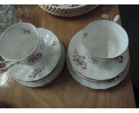 A part tea service with floral and gilt decoration