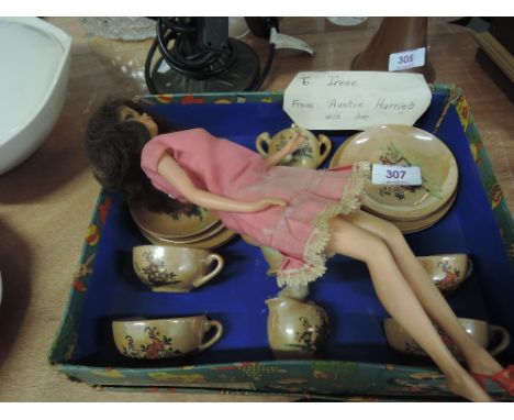 A mid 20th century Japanese Little Hostess tea set, having floral decoration, in original box and a Mattel (Japan) Barbie dol