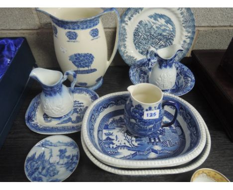 A selection of blue and white ware, including Doulton, Churchill and Copeland Spode