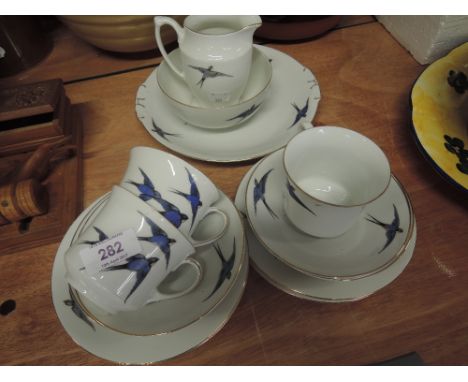 A part tea service with Swallow design