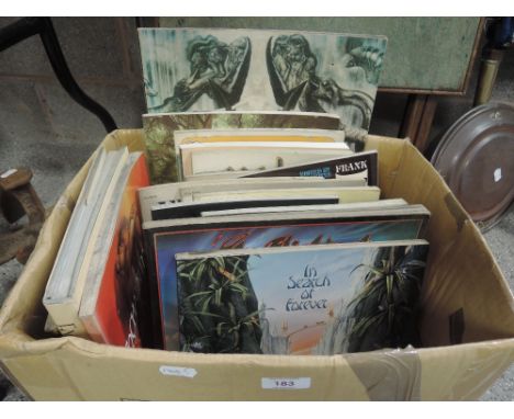 A box of fantasy art/rock art volumes including Rodney Matthews, Frank Frazetta etc