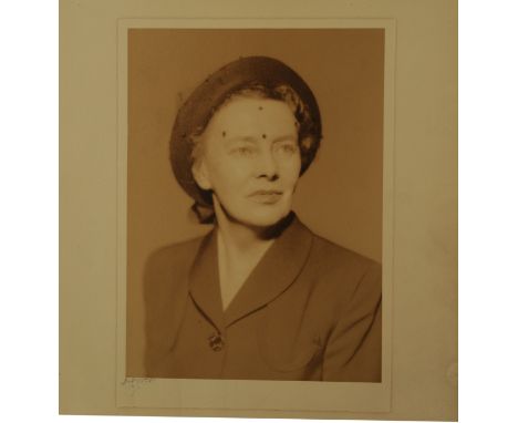 BLACKSTONE STUDIOS INC NEW YORK c.1930s, Margaret Storm Jameson, (1891-1986), half portrait seated, sepia tones, 26.5cm x 18.