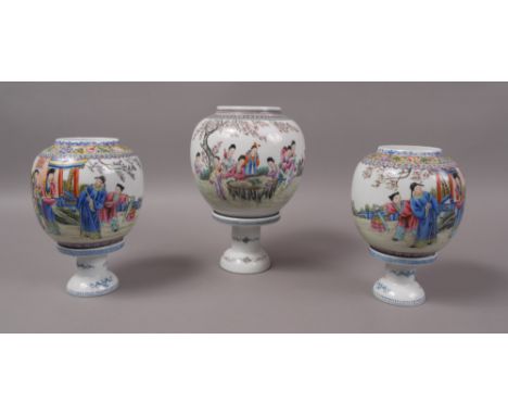 A 20TH CENTURY CHINESE EGGSHELL PORCELAIN LAMP AND SHADE, decorated with maidens in a continuous garden setting, 23cm high; a
