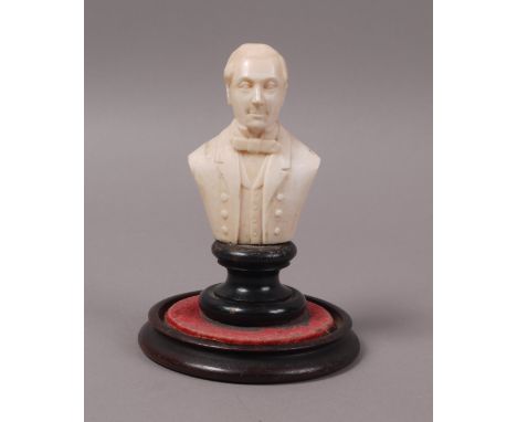 A 19TH CENTURY CONTINENTAL CARVED IVORY BUST OF A COMPOSER, depicted wearing bow tie, formal jacket and waistcoat, on ebonise