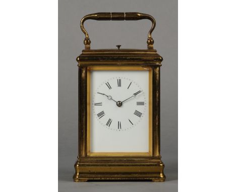 A LATE 19TH CENTURY FRENCH TWO TRAIN CARRIAGE CLOCK WITH ALARUM MOVEMENT, the white enamel dial with Roman numerals, alarm bu