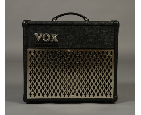 A VOX ESCOURT TWIN INPUT PORTABLE GUITAR AMPLIFIER, battery/mains operation, single 5" speaker, 33cm wide