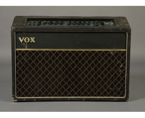 A VOX AC 120 275 WATT TWIN CHANNEL GUITAR AMPLIFIER, with bass, middle, treble and presence controls, harmonic equalisation r