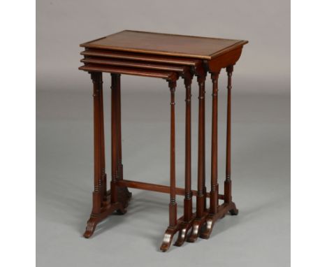 AN EDWARD VII MAHOGANY QUARTETTO OF OCCASIONAL TABLES, rectangular, with beaded detail to the surface, each on twin slender r