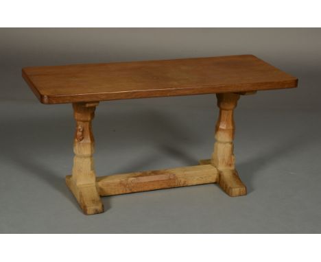 THOMPSON OF KILBURN 'MOUSEMAN'.  An oak rectangular occasional table, an octagonal refectory base with platform feet and stre