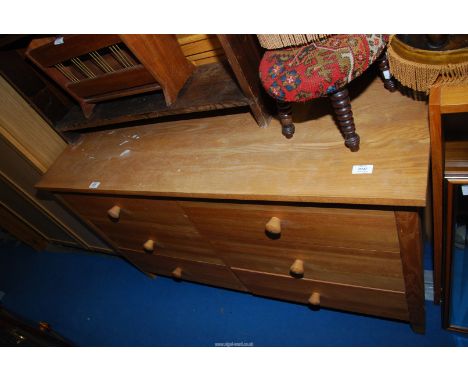 A light oak chest of six drawers, 48 1/2'' wide x 15 1/2'' deep x 28'' high.