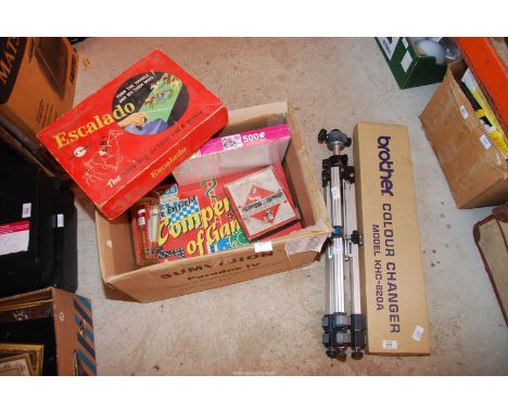 A camera tripod, colour changer, box of vintage games, etc.
