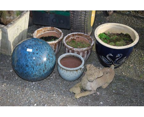 Glazed pots, globe and dog figure.