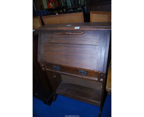 An oak bureau with one drawer and lower shelf, 30'' 40 1/2'' high.