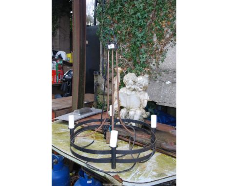 A ceiling light with four bayonet light holders.