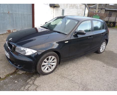 A 2007 BMW 1 series Diesel Hatchback 118d ES 5 door 1995 cc 6 speed manual gearbox motor car finished in solid black with pal