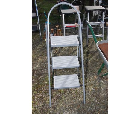 A three rung step ladder.