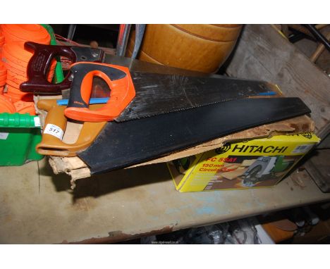 Three wood saws and an Hitachi circular saw.