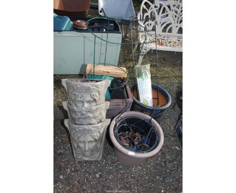 Fibre glass planter, plastic wall plaques, netting etc.