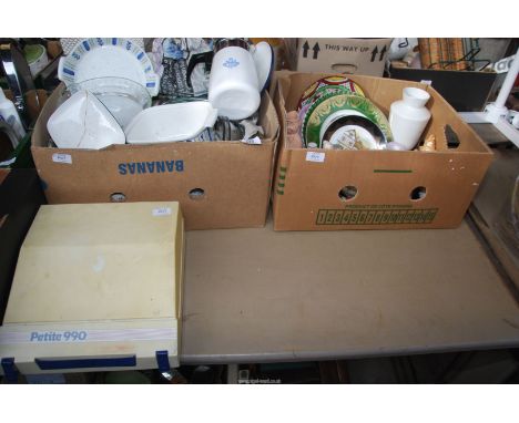 A quantity of Pyrex, China and glass in two boxes, plus a portable typewriter.