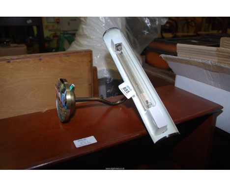 A overhead picture light.