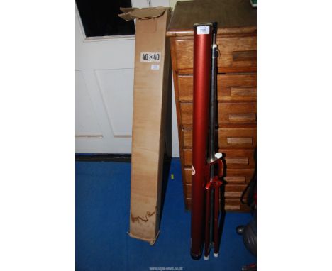 A pull out slide projector screen, 40'' square, with tripod.