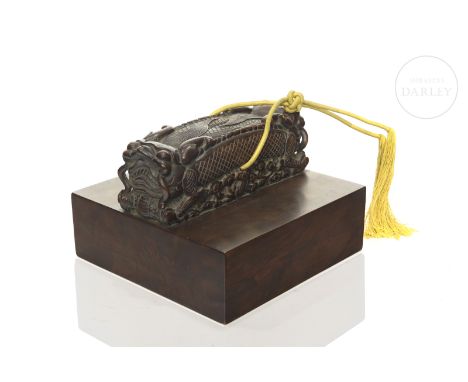 Large carved wooden jade seal, formed by three pieces of wood joined together. With a square base, it is crowned by the image