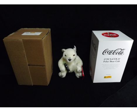 Germany Margarete Steiff Giengen/Brenz - 666032 'Coca-Cola Polar Bear Cub'. 2000 Limited Edition number 04319. Knopf im Ohr o